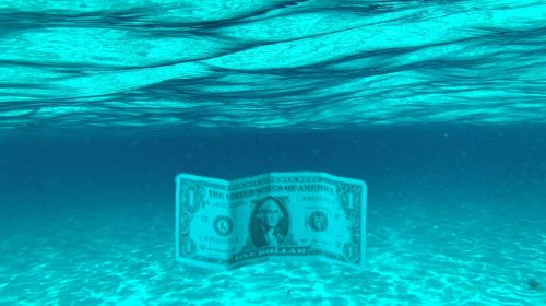 dollar under water unsplash canva